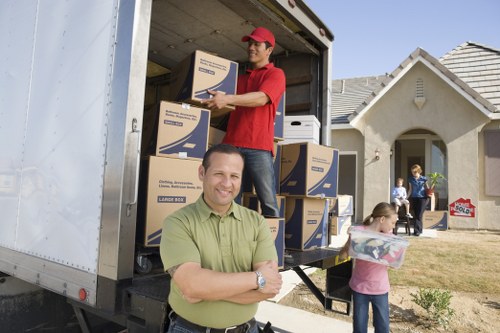 Loading furniture and boxes into a local removal van in Kingston