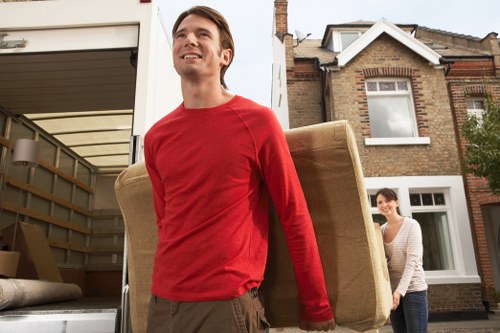 Packed household items and furniture ready for a Kingston house removal