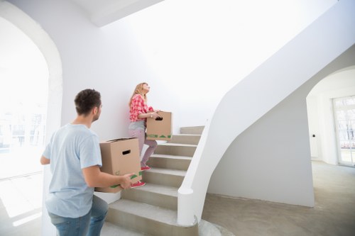 Packing boxes and furniture prepared for a Kingston relocation