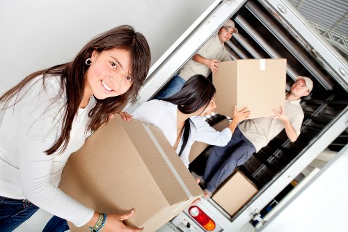 Moving team handling packing and transport for a Kingston customer